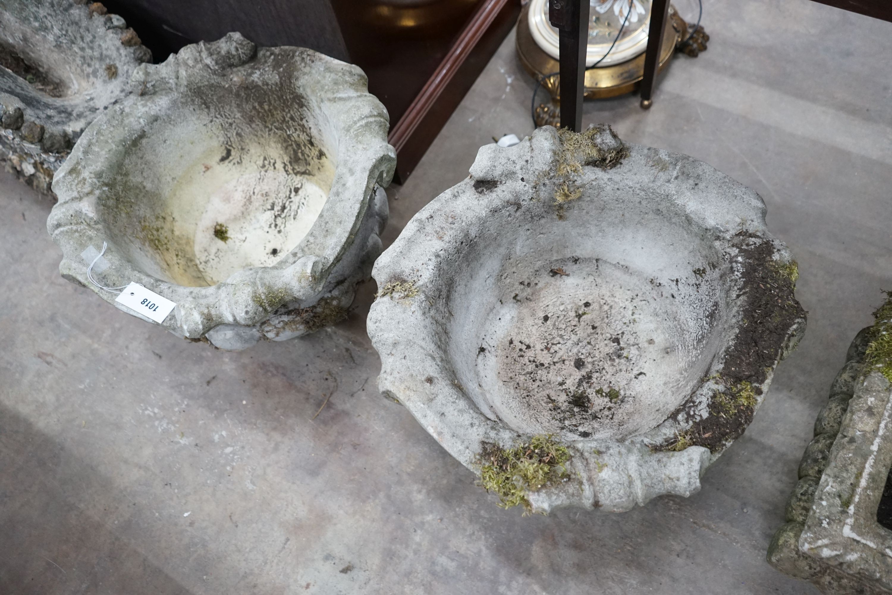 A pair of circular reconstituted stone fluted garden planters, diameter 52cm, height 39cm